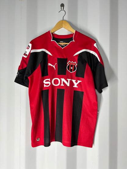 Camiseta local Alajuelense 2011.