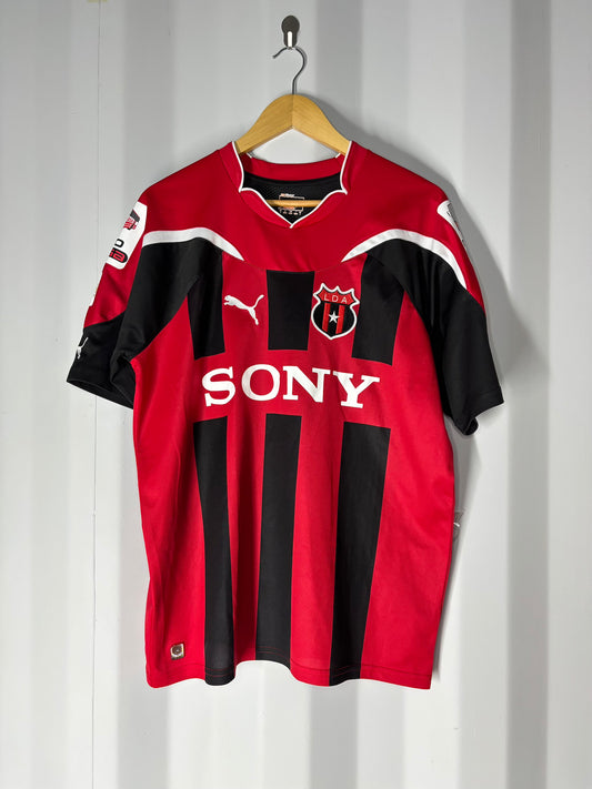 Camiseta local Alajuelense 2011.
