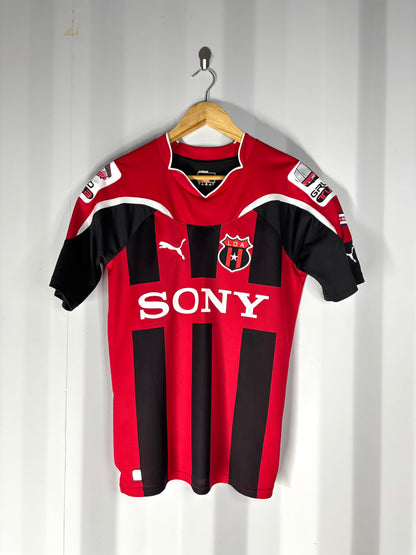 Camiseta local de Alajuelense temporada 2011 parte trasera.