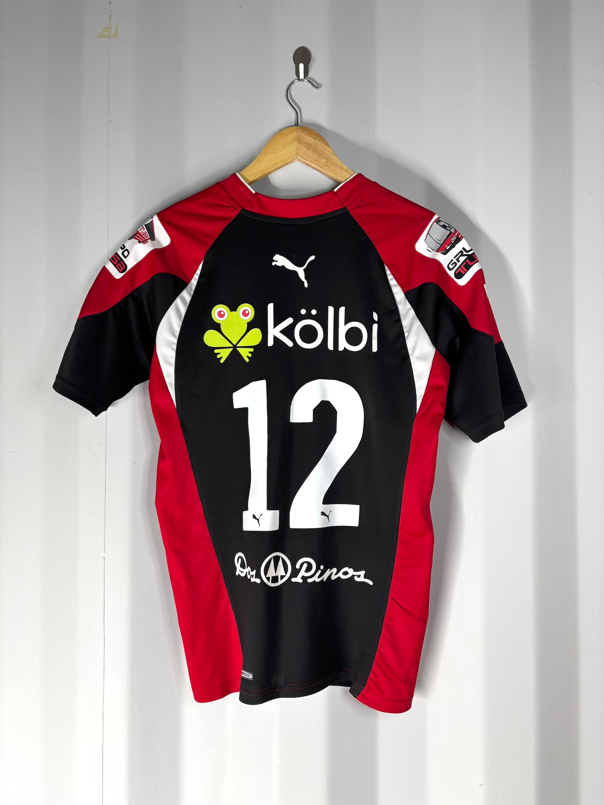 Camiseta local de Alajuelense temporada 2011.