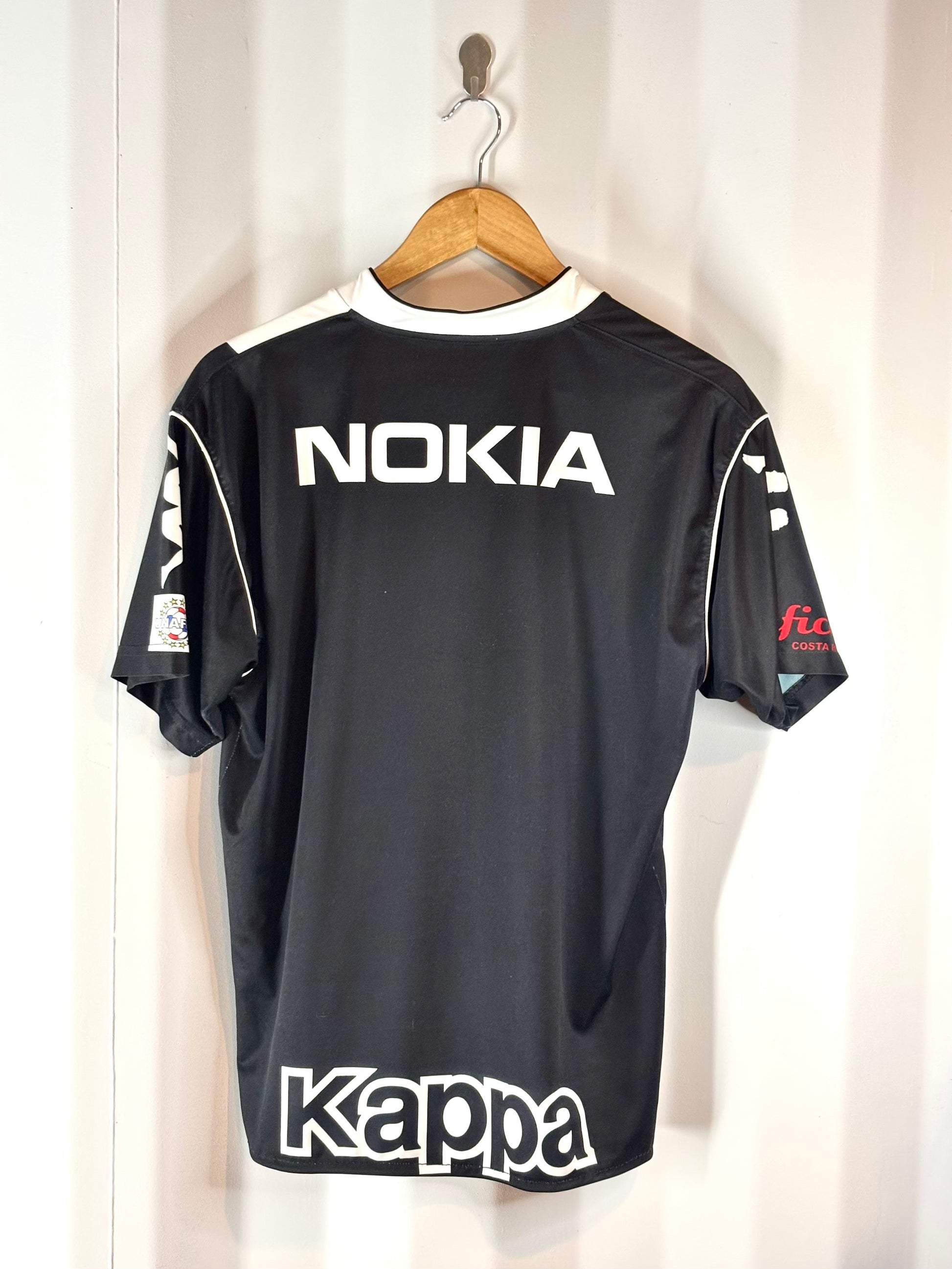 Parte trasera Brujas de Escazú camiseta Kappa 2008