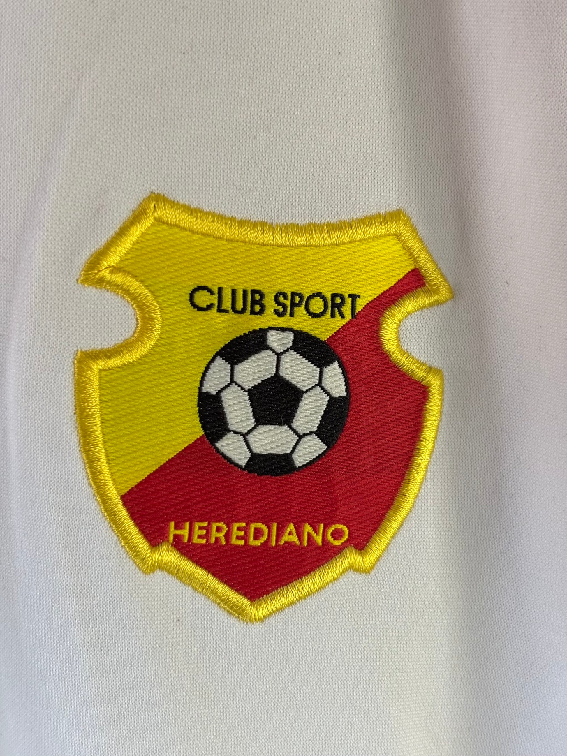 Camiseta Club Sport Herediano marca jugados foto del escudo 