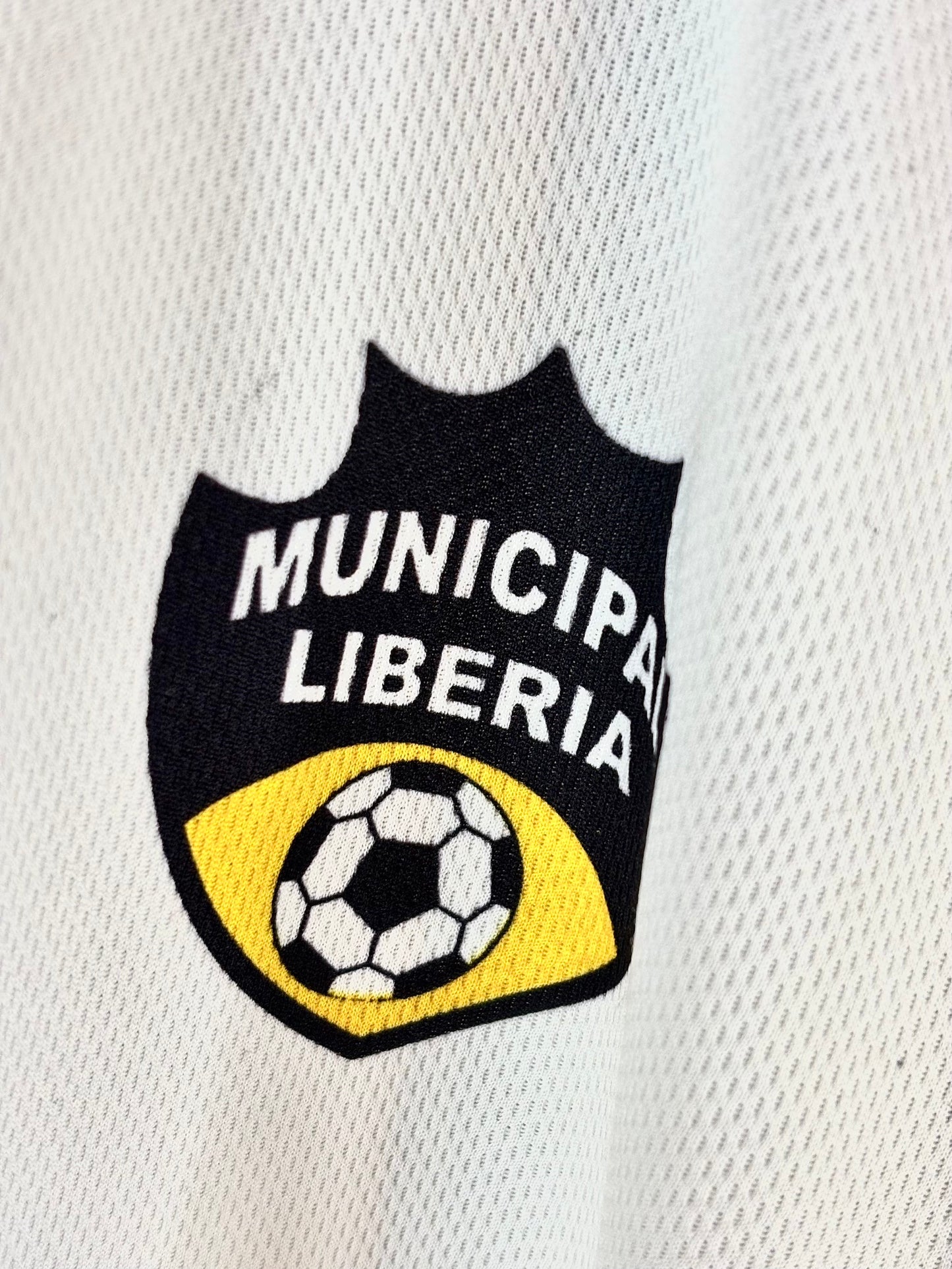 Camiseta de visitante del Municipal Liberia para la temporada 2006 marca Forza escudo 